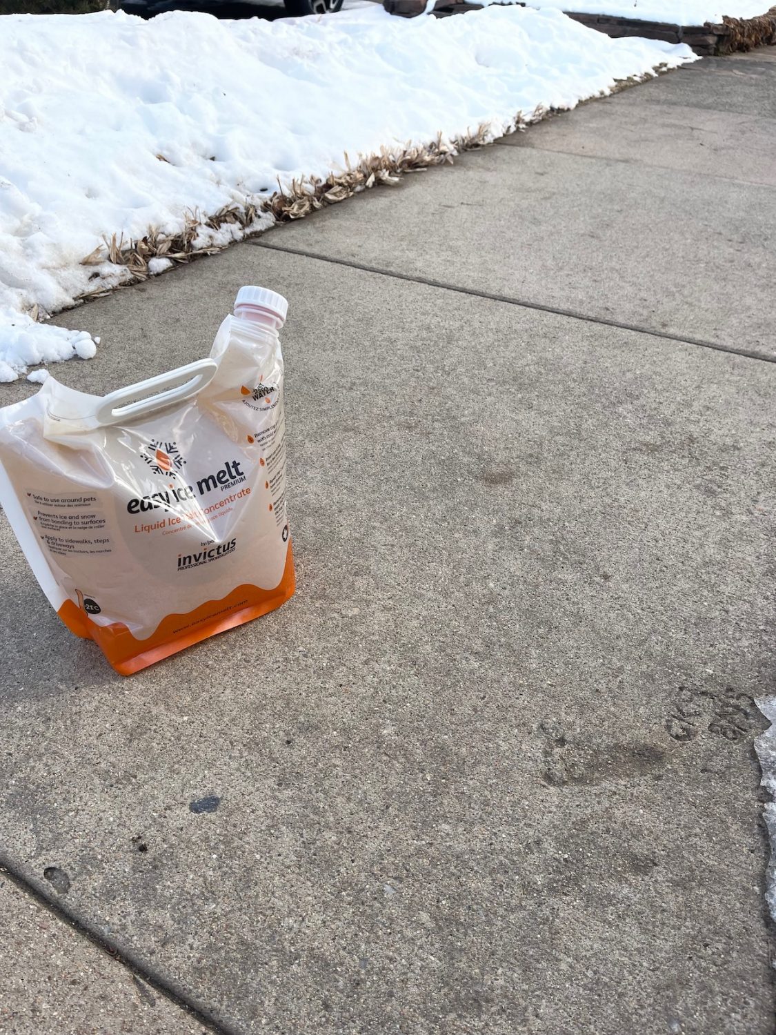 tests of liquid ice melt Easy Ice Melt sidewalk area